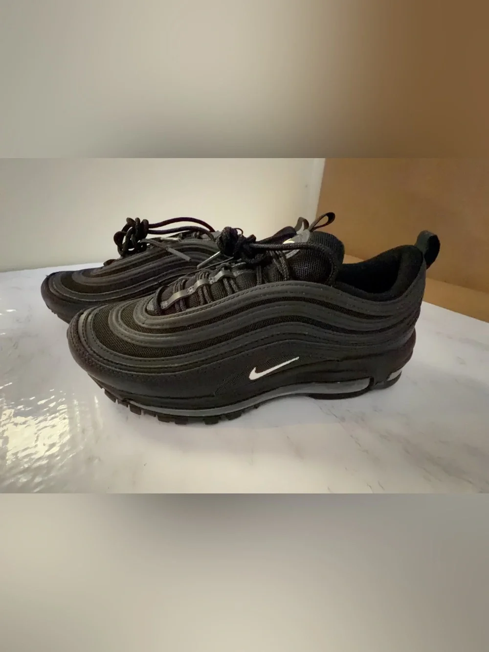 Nike Men’s Black Sneakers with White Swoosh